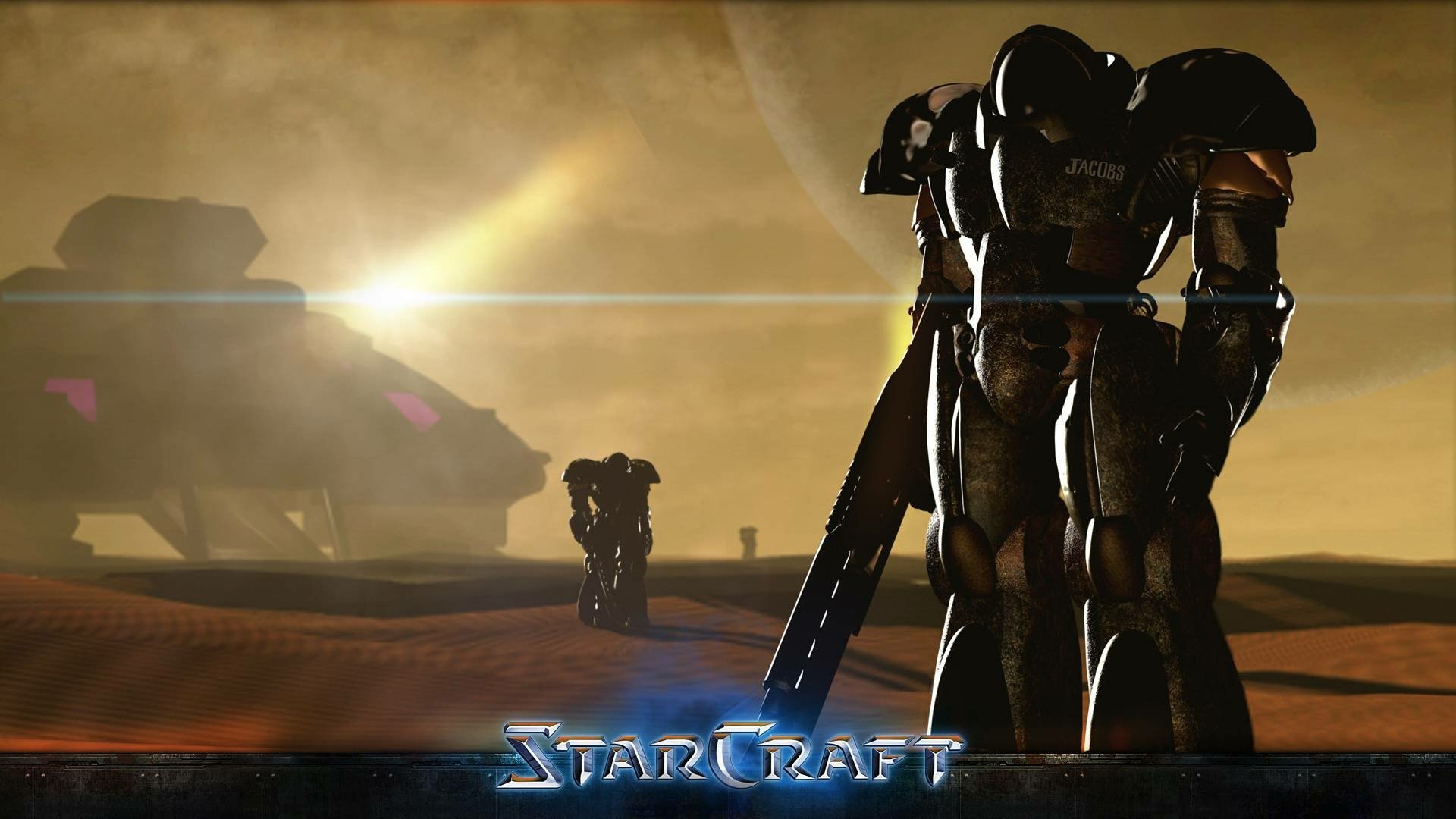 StarCraft video game HD PC desktop wallpaper: two armored Terran marines stand on a dusty alien plain beneath a golden sky, a dropship in the distance and the StarCraft logo at the bottom.