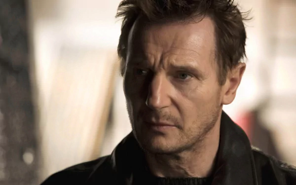HD desktop wallpaper featuring a focused man in a leather jacket, offering a cinematic feel.