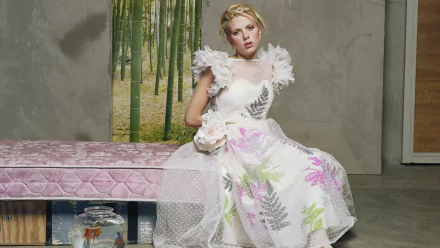 A 4K Ultra HD PC desktop wallpaper featuring Scarlett Johansson in a delicate white dress with floral accents, seated indoors against a bamboo backdrop.