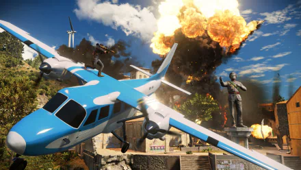 HD PC desktop wallpaper featuring an intense explosion scene from the video game Just Cause 3, with a blue and white plane in mid-flight against a bright sky.