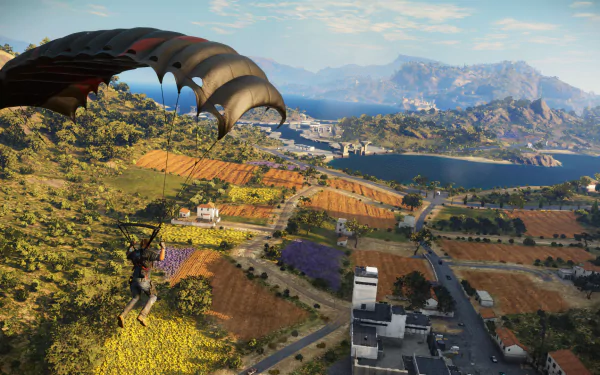 Rico Rodriguez parachutes over a vibrant landscape in Just Cause 3, captured in an HD PC desktop wallpaper from the video game.
