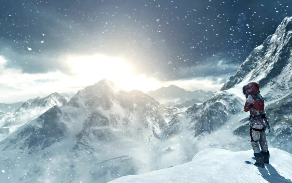 Lara Croft stands in a snowy landscape, gazing at a stunning sunrise over imposing mountains, capturing a moment from the video game Rise of the Tomb Raider. HD PC desktop wallpaper.