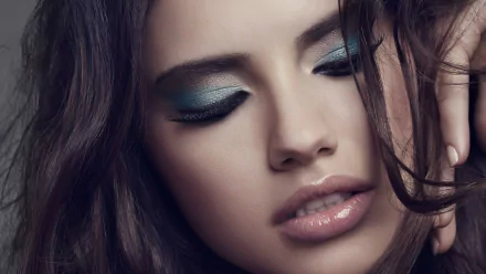 Close-up of Adriana Lima with smoky eye makeup, captured in an HD PC desktop wallpaper and background image.