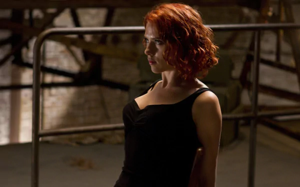 A captivating HD wallpaper of Natasha Romanoff, also known as Black Widow, showcasing Scarlett Johansson in a powerful pose from The Avengers.