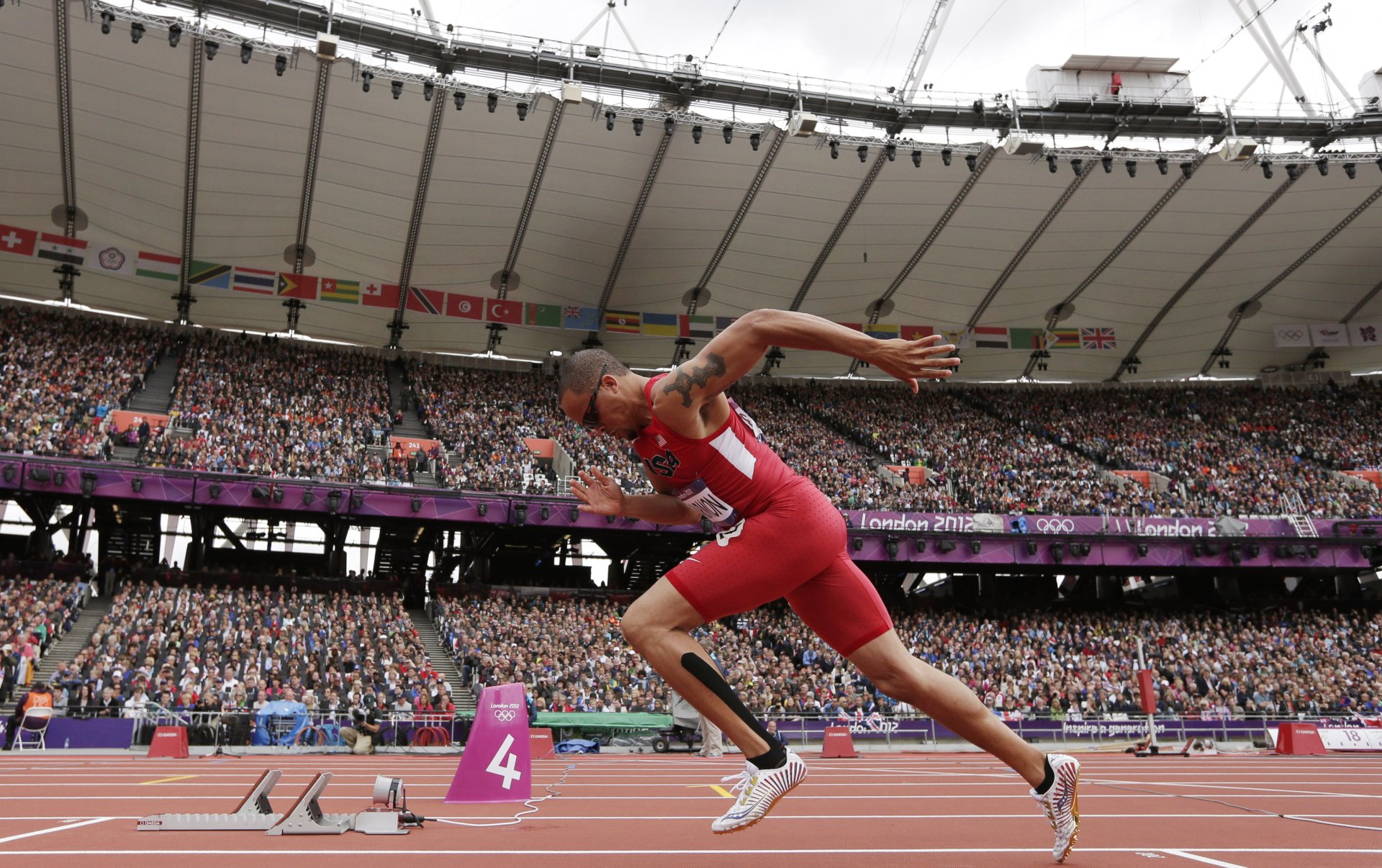 Download Track & Field Sports 4k Ultra HD Wallpaper