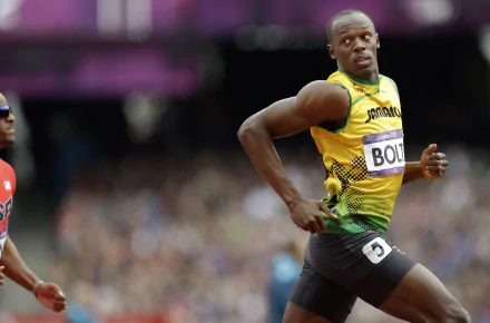 HD desktop wallpaper of Usain Bolt, tagged with sports. Bolt is captured mid-race, wearing a yellow and green uniform, head turned to the side, showcasing athletic determination.