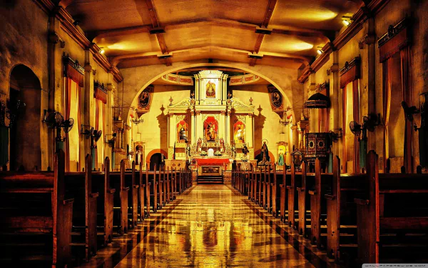 Interior view of St. James the Apostle Parish Church with wooden pews and a glowing altar, captured in a high-definition desktop wallpaper and background.