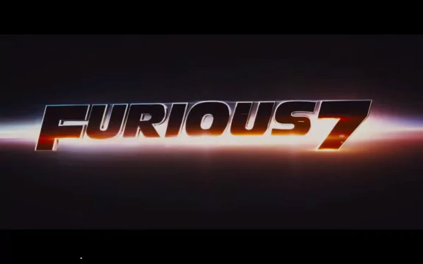 HD desktop wallpaper featuring the title Furious 7, showcasing bold, dynamic lettering against a sleek background, capturing the essence of the action-packed movie.