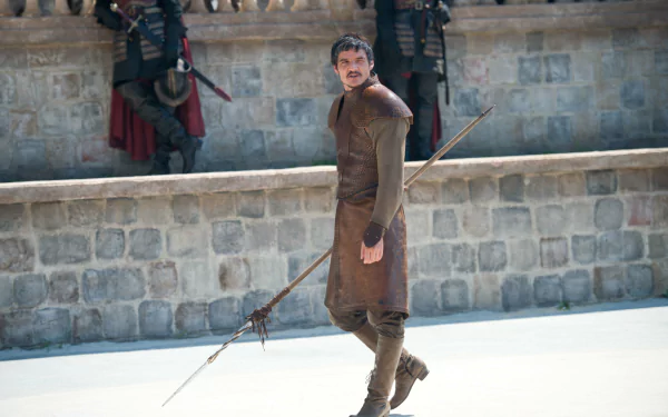 Pedro Pascal as Oberyn Martell in a high-resolution 4K Ultra HD Game of Thrones TV show wallpaper, set against a stone wall background.