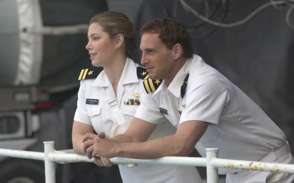 HD PC desktop wallpaper featuring two characters from the movie Stealth in naval officer uniforms, leaning on a railing and looking thoughtfully ahead.