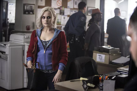 HD PC desktop wallpaper featuring a scene from the TV show iZombie, showcasing the main character in a police station setting.
