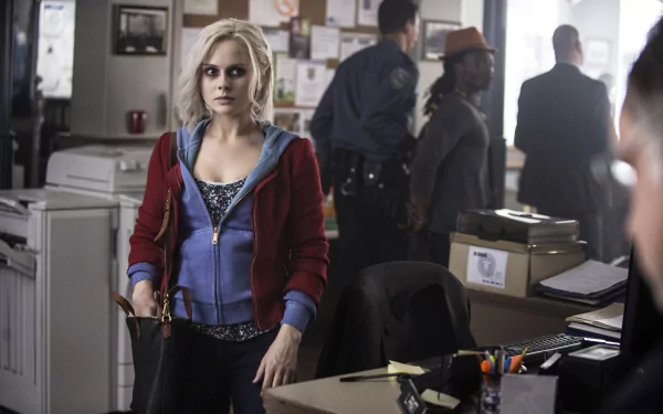 HD PC desktop wallpaper featuring a scene from the TV show iZombie, showcasing the main character in a police station setting.