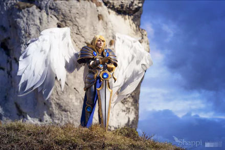 High-definition wallpaper showcasing a female cosplayer as Kayle from League of Legends, featuring detailed armor and majestic wings against a stunning outdoor backdrop.