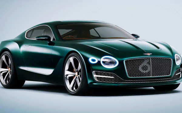 A sleek green Bentley EXP 10 Speed 6 supercar showcases its modern design and powerful stance, set against a minimalist backdrop in this stunning 4K Ultra HD wallpaper.