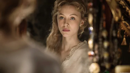 HD desktop wallpaper featuring Canadian actress Sarah Gadon with blonde hair and blue eyes from the movie Dracula Untold.