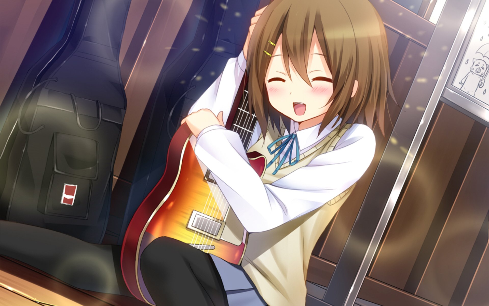 Yui Hirasawa (K‑ON! anime) smiling and hugging her electric guitar in a sunlit room — HD PC desktop wallpaper/background.