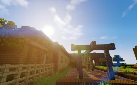 A vibrant Minecraft scene featuring wooden buildings beneath a bright sky, with sunlight streaming down and a charming pathway, making it an engaging HD desktop wallpaper.