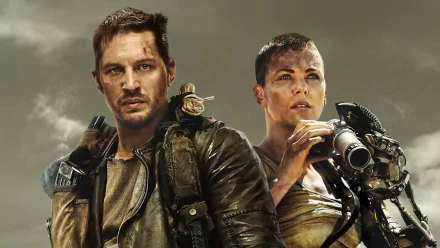 Max Rockatansky and Imperator Furiosa stand together in a dynamic scene from *Mad Max: Fury Road*, capturing the gritty essence of the film in this HD wallpaper.