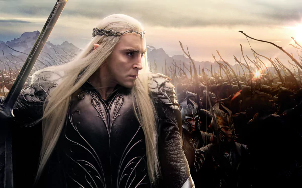 Stunning HD wallpaper from *The Hobbit: The Battle of the Five Armies*, featuring an elven warrior in armor, poised against a backdrop of a vast battle and dramatic skies.