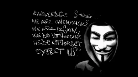 HD desktop wallpaper featuring an anonymous figure in a mask, accompanied by text emphasizing themes of knowledge and anonymity. The background is black, creating a stark contrast.