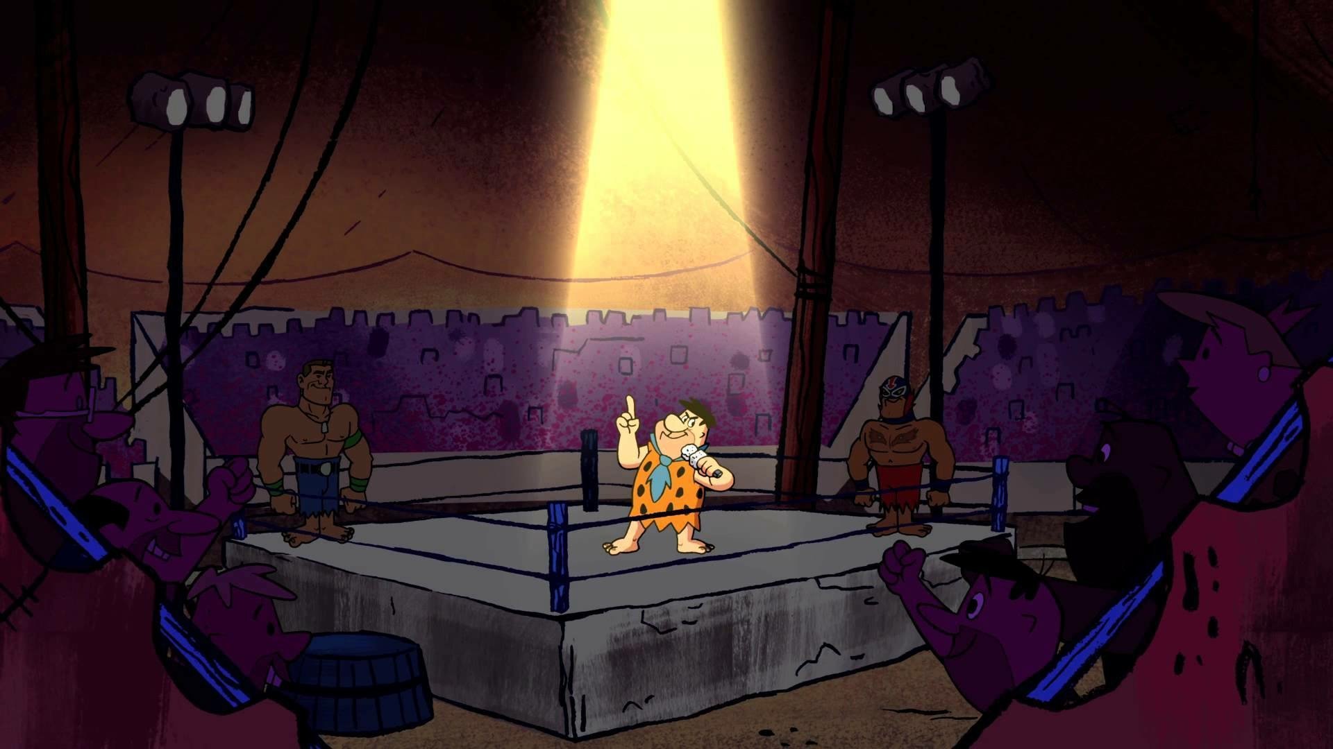 HD PC wallpaper from The Flintstones & WWE: Stone Age SmackDown! — Fred Flintstone stands in a spotlight in a Stone Age wrestling ring while cavemen and wrestlers cheer from the crowd.