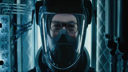 HD desktop wallpaper of Reed Richards from the 2015 sci-fi movie Fantastic Four, showcasing him in a high-tech suit and helmet against a futuristic background.