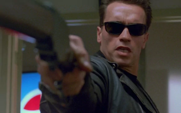Arnold Schwarzenegger as the Terminator in a gripping scene from Terminator 2: Judgment Day, poised with a weapon in a dynamic, high-definition backdrop.