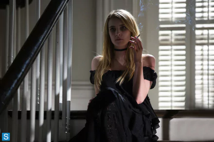 Emma Roberts in a dark, moody scene from the TV show American Horror Story, featured in an HD PC desktop wallpaper and background.