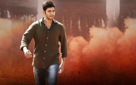 HD PC desktop wallpaper featuring Mahesh Babu from the movie Srimanthudu, showcasing him walking confidently against a smoky, dramatic background.