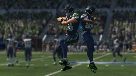 HD wallpaper from Madden NFL 16 featuring two virtual football players celebrating on the field with a stadium audience in the background.