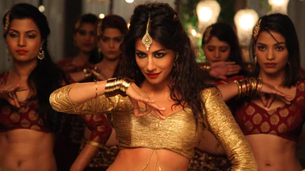 Chitrangada Singh performing a dance scene from the movie Gabbar Is Back, featured in a 4K Ultra HD PC desktop wallpaper and background.