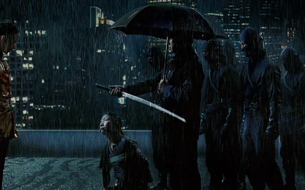 Ninja Assassin movie HD PC desktop wallpaper and background: rain-soaked rooftop at night, masked ninjas surround a kneeling captive while one holds an umbrella and blade.