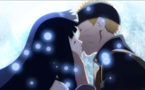 HD desktop wallpaper featuring Hinata Hyuga and Naruto Uzumaki from the anime Naruto. The scene depicts the two characters sharing a tender kiss, surrounded by soft glowing orbs of light.