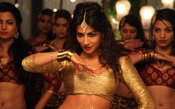 Chitrangada Singh performing a dance scene from the movie Gabbar Is Back, featured in a 4K Ultra HD PC desktop wallpaper and background.
