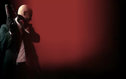 HD PC desktop wallpaper from the video game Hitman: Absolution — Agent 47 in a suit, bald, holding a silenced pistol at left against a red-to-black gradient background.