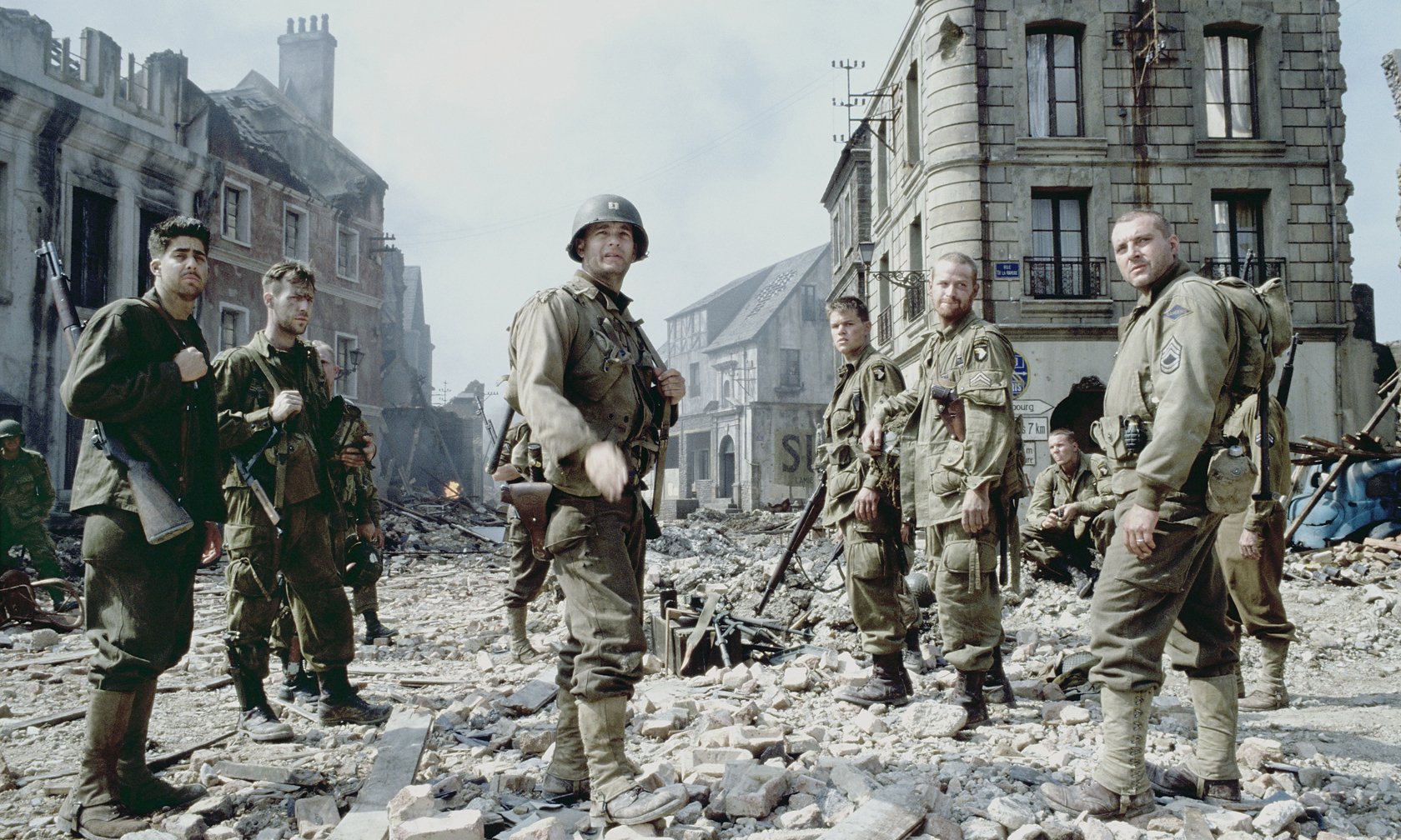 A dramatic scene from Saving Private Ryan, showcasing soldiers in a war-torn urban environment, captured in vibrant HD for a striking PC desktop wallpaper.