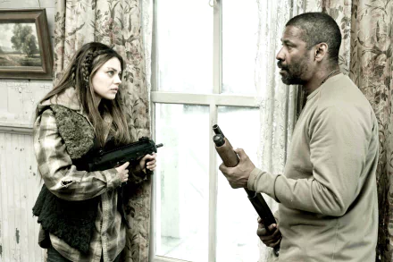 Two actors in a tense post-apocalyptic movie scene: a woman aims a rifle while a man holds a shotgun by a curtained window — 2K Quad HD PC desktop wallpaper.