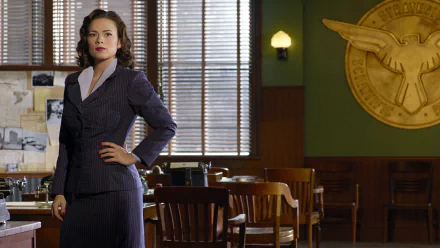 HD desktop wallpaper featuring Hayley Atwell as Agent Carter in a vintage office setting from the TV show Agent Carter.