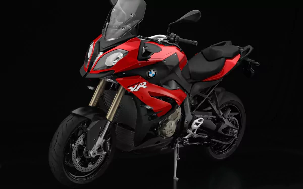 Red BMW S1000 XR motorcycle showcased on a black background, serving as a high-definition PC desktop wallpaper featuring the sleek BMW vehicle design.