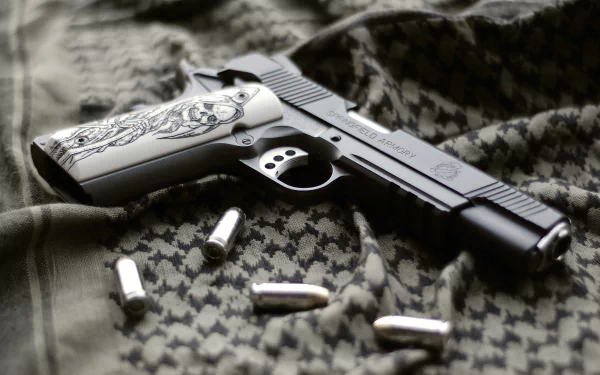 HD desktop wallpaper featuring a Springfield Armory pistol with detailed grips, resting on patterned fabric alongside scattered bullets.