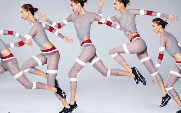 4K Ultra HD PC desktop wallpaper: a celebrity model captured in multiple running poses, wearing translucent athleticwear with red accents on a pale gray background.