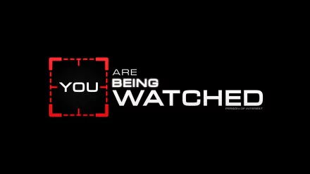 A captivating HD desktop wallpaper featuring the iconic phrase YOU ARE BEING WATCHED, inspired by the TV show Person Of Interest, set against a sleek black background.