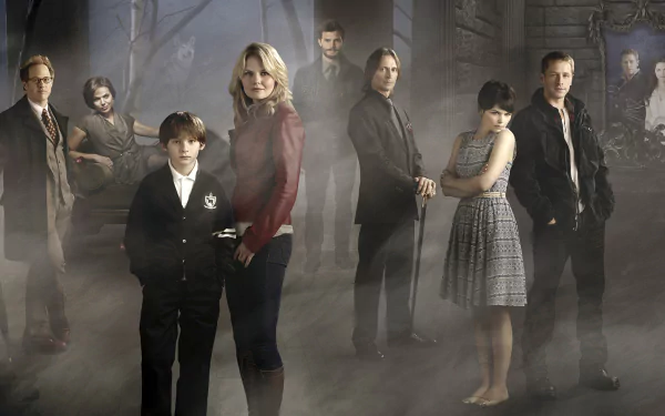 A dramatic scene from the TV show Once Upon A Time, featuring characters in a mystical setting, with fog enveloping them, creating an enchanting and mysterious atmosphere.