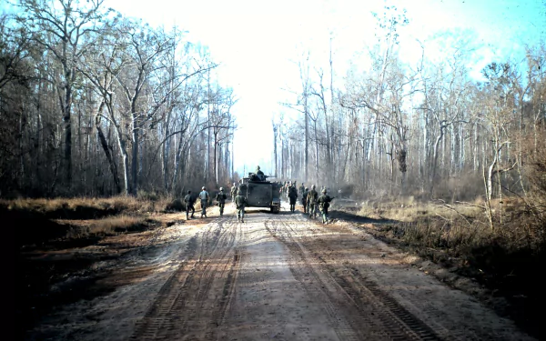  Patrolling by US troops with armour support