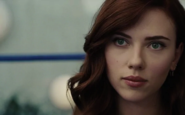 A close-up of Scarlett Johansson as she appears in Iron Man 2, showcasing her striking features and captivating expression in this HD desktop wallpaper.