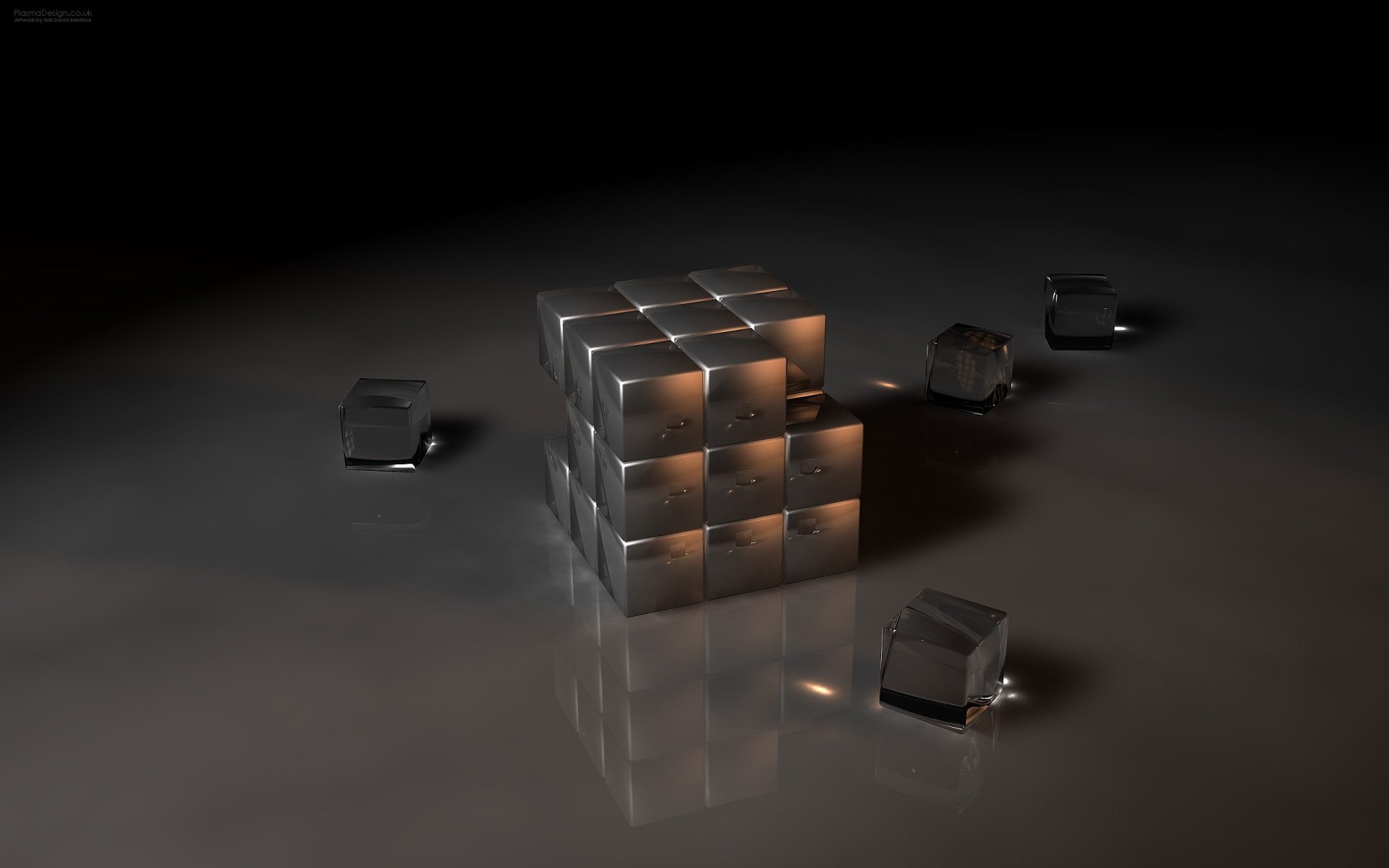An abstract HD desktop wallpaper featuring a cluster of illuminated cubes against a dark background, with smaller cubes scattered around, creating a striking visual effect.
