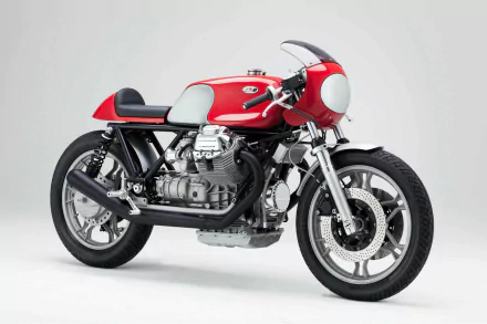 Red Moto Guzzi cafe‑racer motorcycle on a clean white backdrop, a vehicle image presented as an HD PC desktop wallpaper and background.