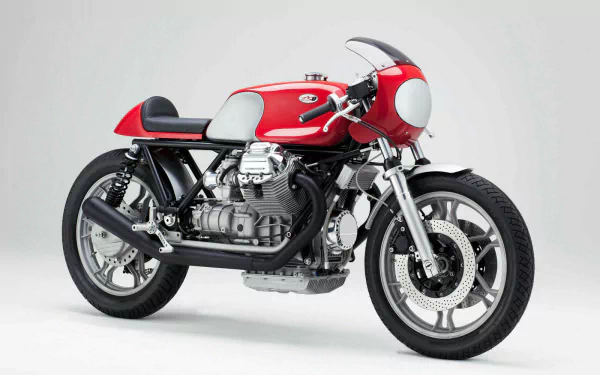 Red Moto Guzzi cafe‑racer motorcycle on a clean white backdrop, a vehicle image presented as an HD PC desktop wallpaper and background.