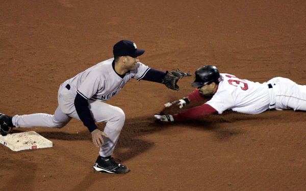 A dynamic baseball scene captures a player sliding into base while another player reaches to tag him, showcasing the intensity of the sport in an HD desktop wallpaper.