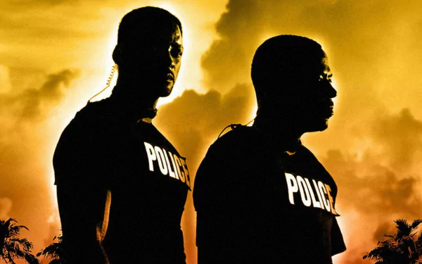 HD PC desktop wallpaper featuring two police officers silhouetted against a dramatic orange sky, inspired by the movie Bad Boys II.
